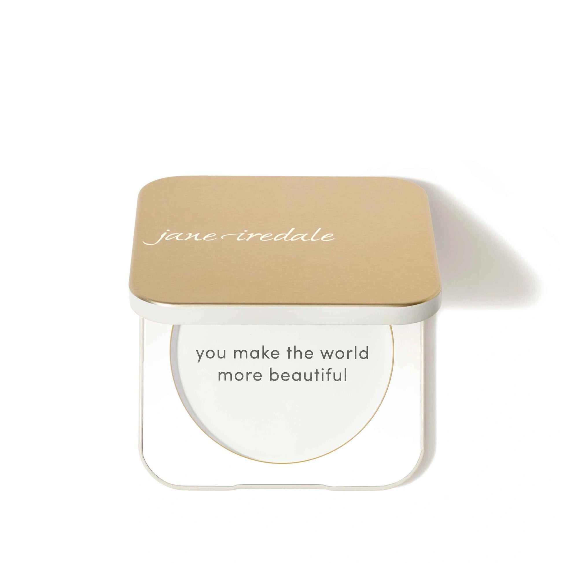 Jane Iredale Refillable Compact Dusty Gold met luxe afwerking en inspirerende tekst voor een mooie uitstraling.