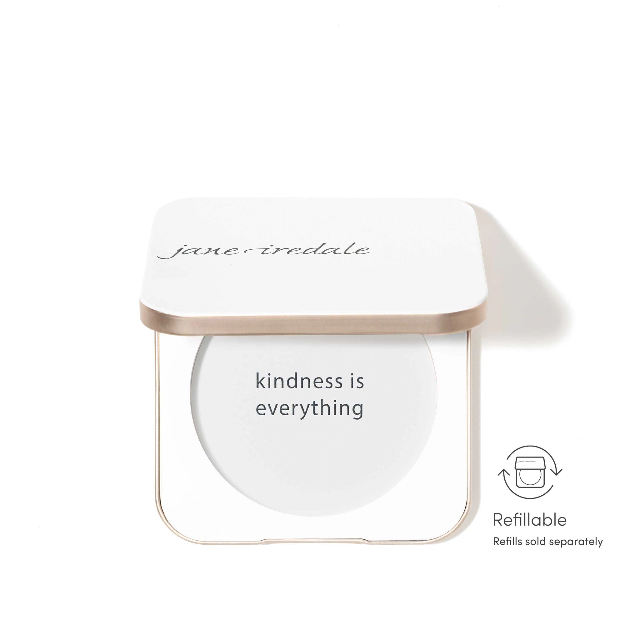 Jane Iredale Refillable Compact White met minimalistische afwerking en de tekst 'kindness is everything'.
