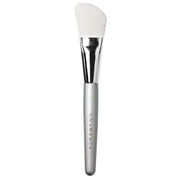 Cosmedix Dual-Sided Silicone Mask Applicator met geribbelde en gladde zijde voor een gelijkmatige aanbrenging van gezichtsmaskers.