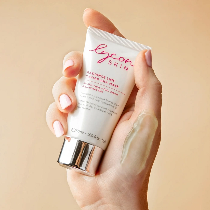 LYCON Skin Radiance Lime Caviar AHA Mask 50ml in hand with creamy texture, highlighting exfoliating benefits for glowing skin.