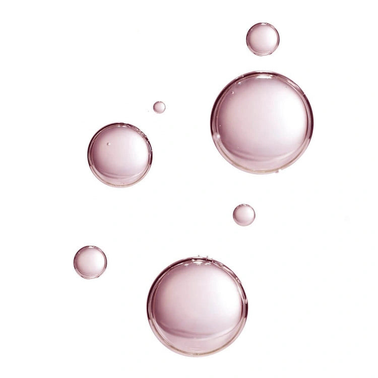 PUR Lit Mist Illuminating Setting Spray 100ml glazen druppels met hydraterende textuur op een witte achtergrond.