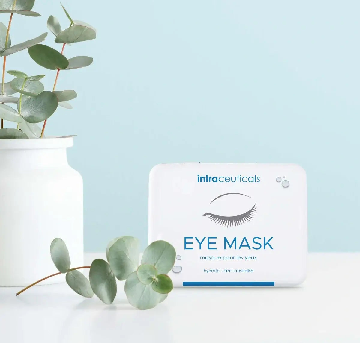 Intraceuticals Rejuvenate Eye Mask (6 pairs) verpakt in elegante doos met eucalyptusplant op achtergrond