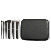 Youngblood Travel Luxe Brush Set met 6 zwarte kwasten en kunstleren etui voor gemak onderweg.